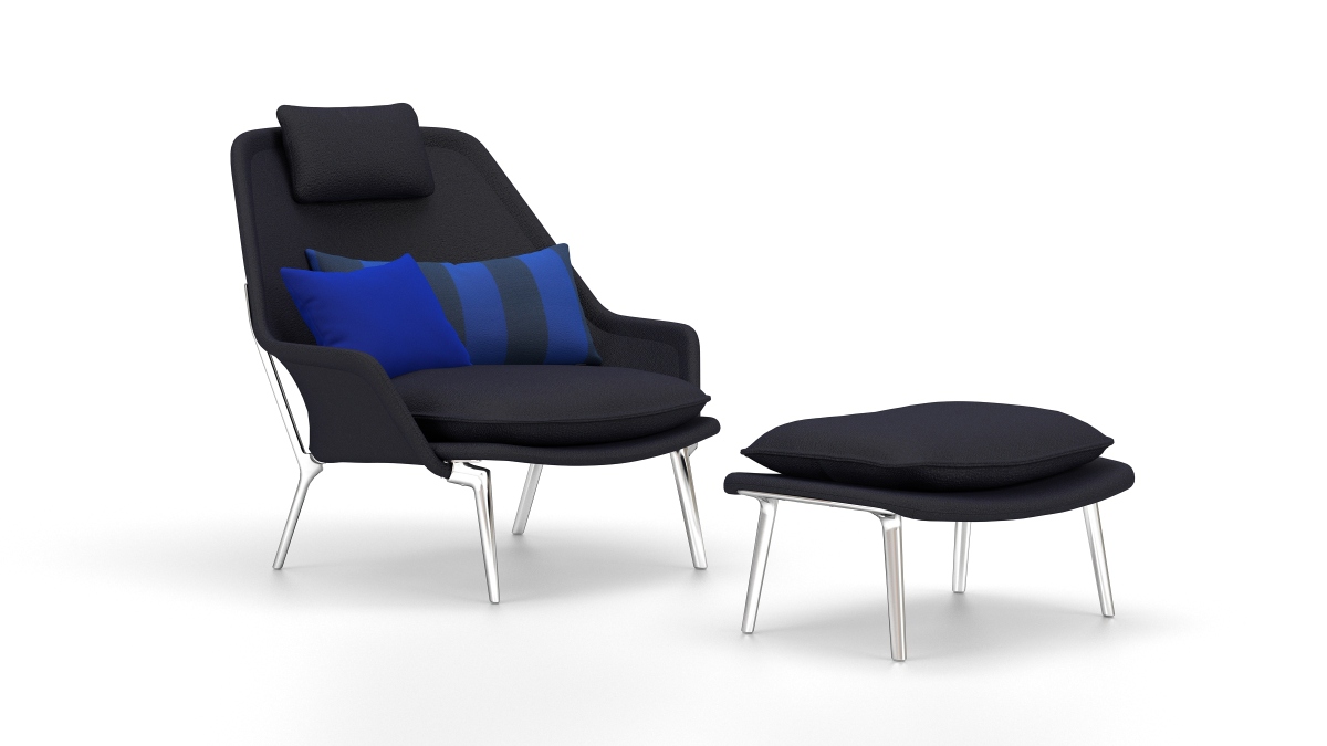 Vitra Slow Chair mit Ottoman in dunklem Stoff und Kissen, bequeme Sitzgelegenheit.