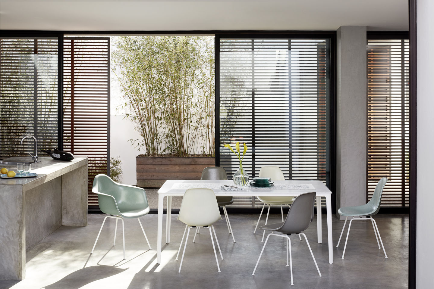 Eames Plastic Arm Chair DAX with seat cushion Vitra