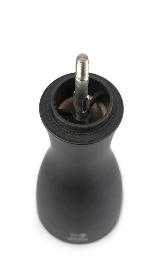 Detailaufnahme der schwarzen Peugeot Tahiti Mühle mit offenem Mahlwerk, ideal für Salz und Pfeffer.