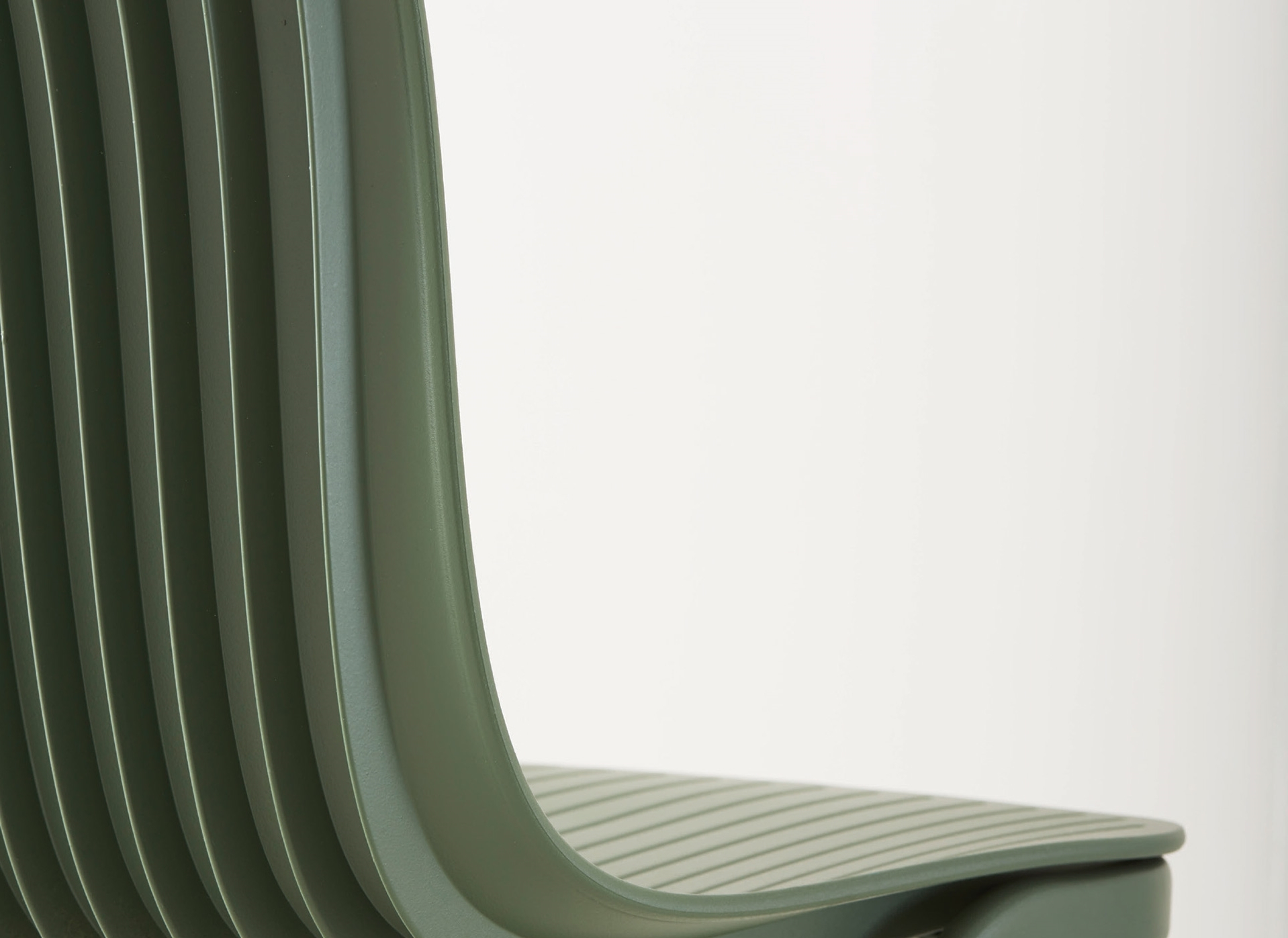 Dragonfly Stacking Chair Segis green