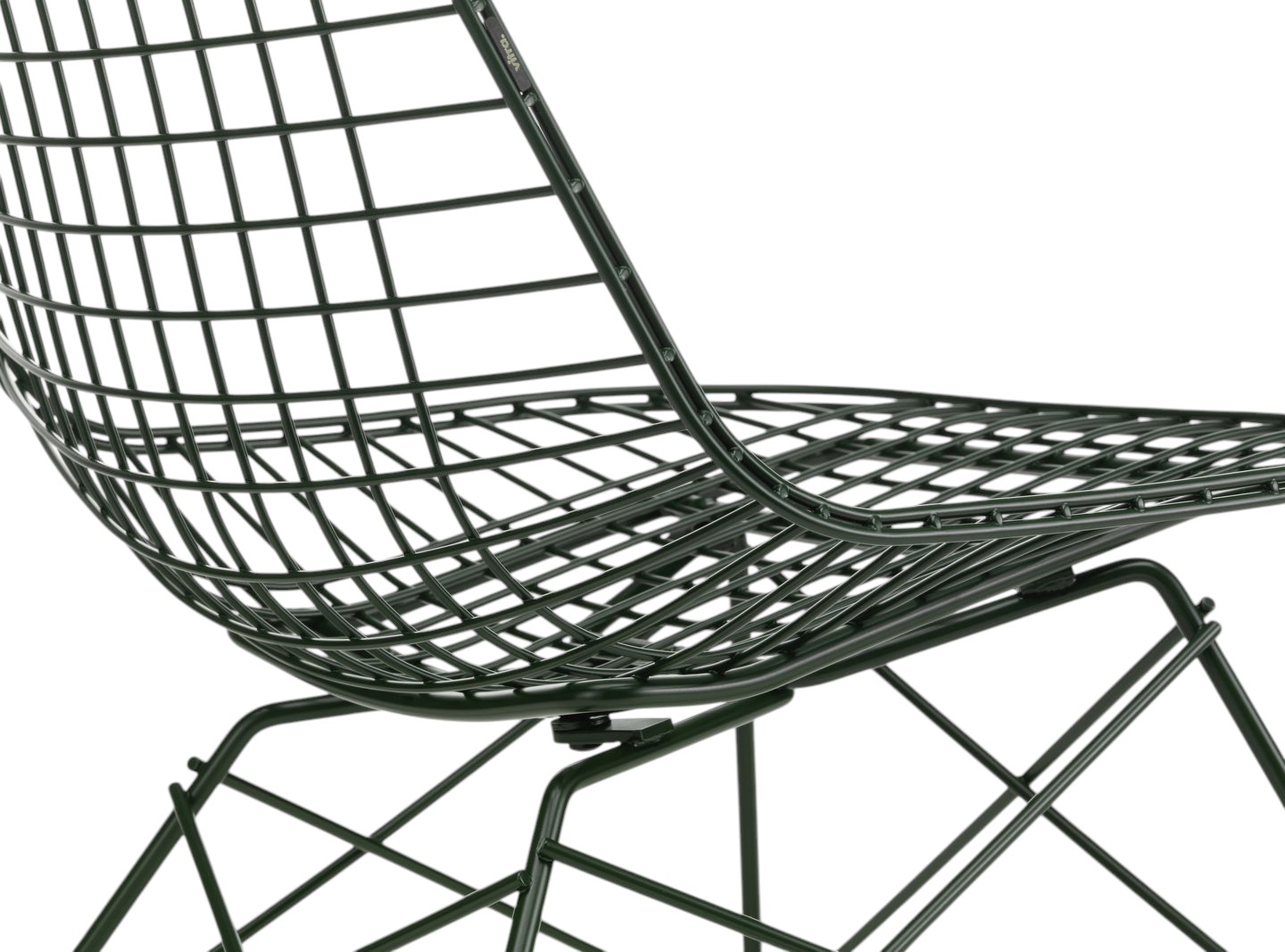 Detailaufnahme des Vitra Wire Chair Stuhls in Dunkelgrün, ungepolstert, mit filigranem Drahtgestell und minimalistischem Design.