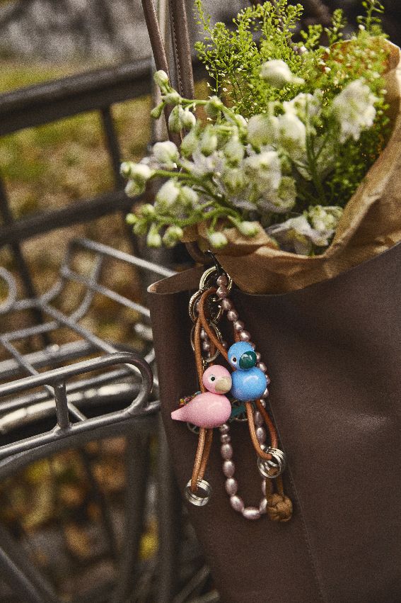 Bird pink key ring silver coloured metal with natural leather Kay Bojesen