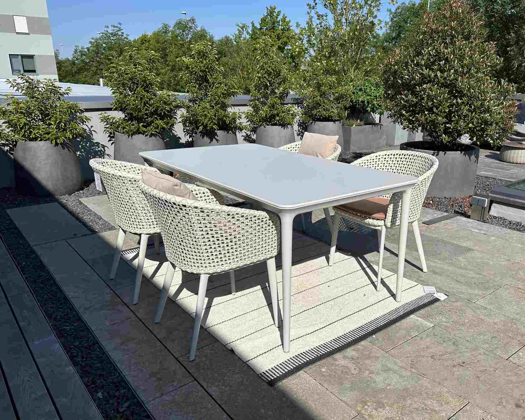 Bellmonde Table and Mbrace Armchair Combination Outdoor Dedon EXHIBITION PIECE