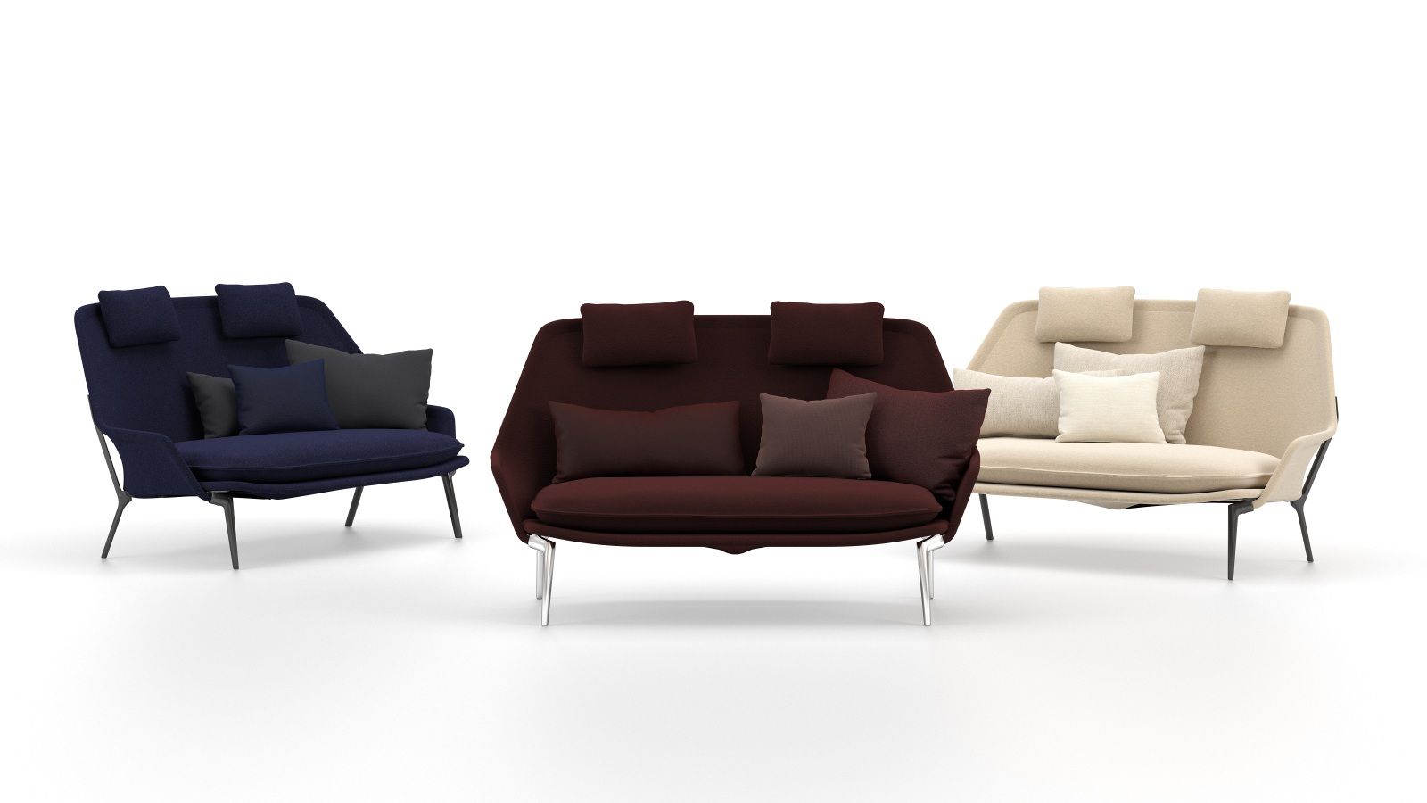Vitra Slow Sofa aus Stoff in Blau, Braun und Beige mit passenden Kissen.