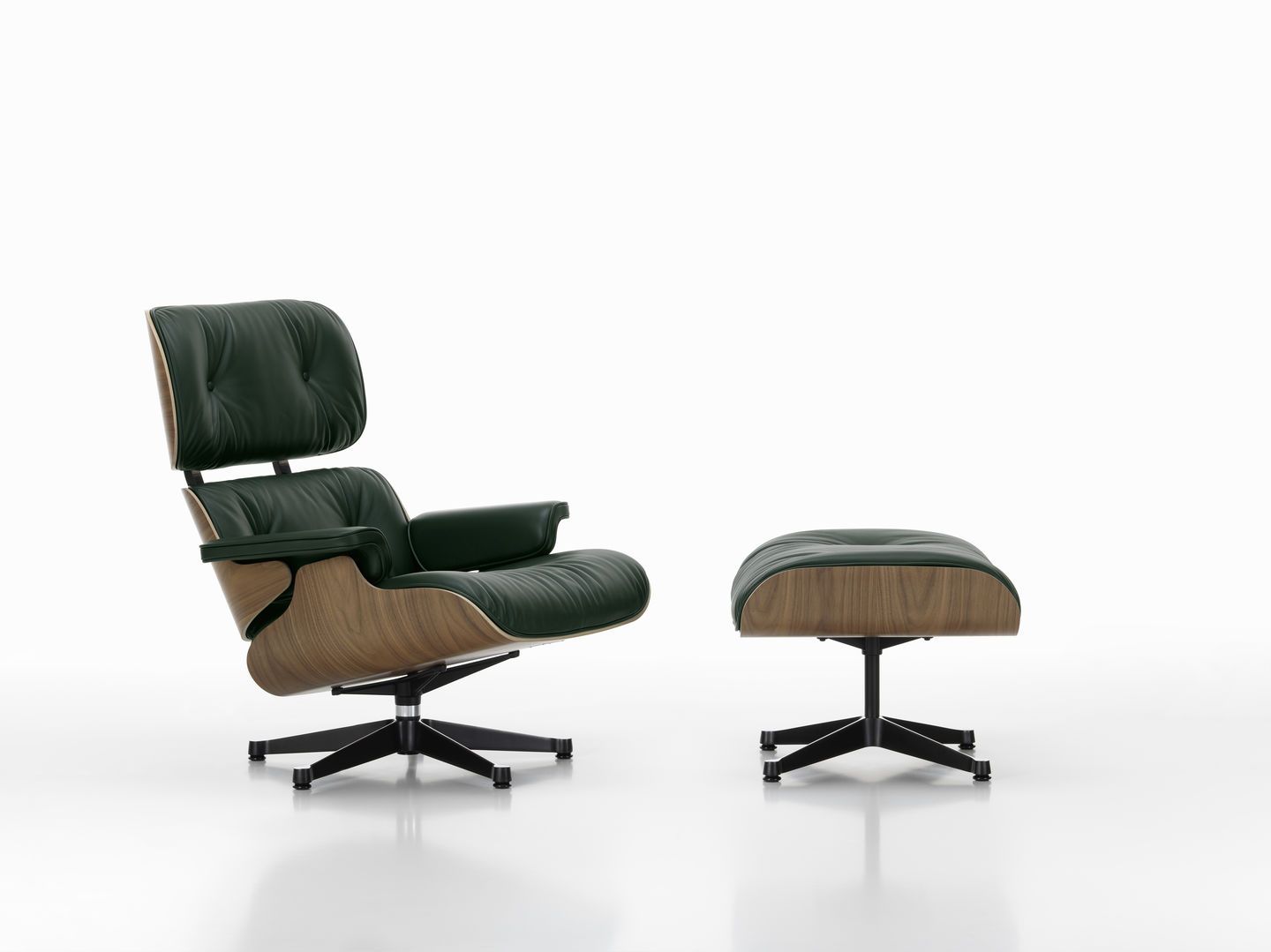 Eames Lounge Chair mit Ottoman in dunklem Grün und Holz, Designklassiker von Vitra.