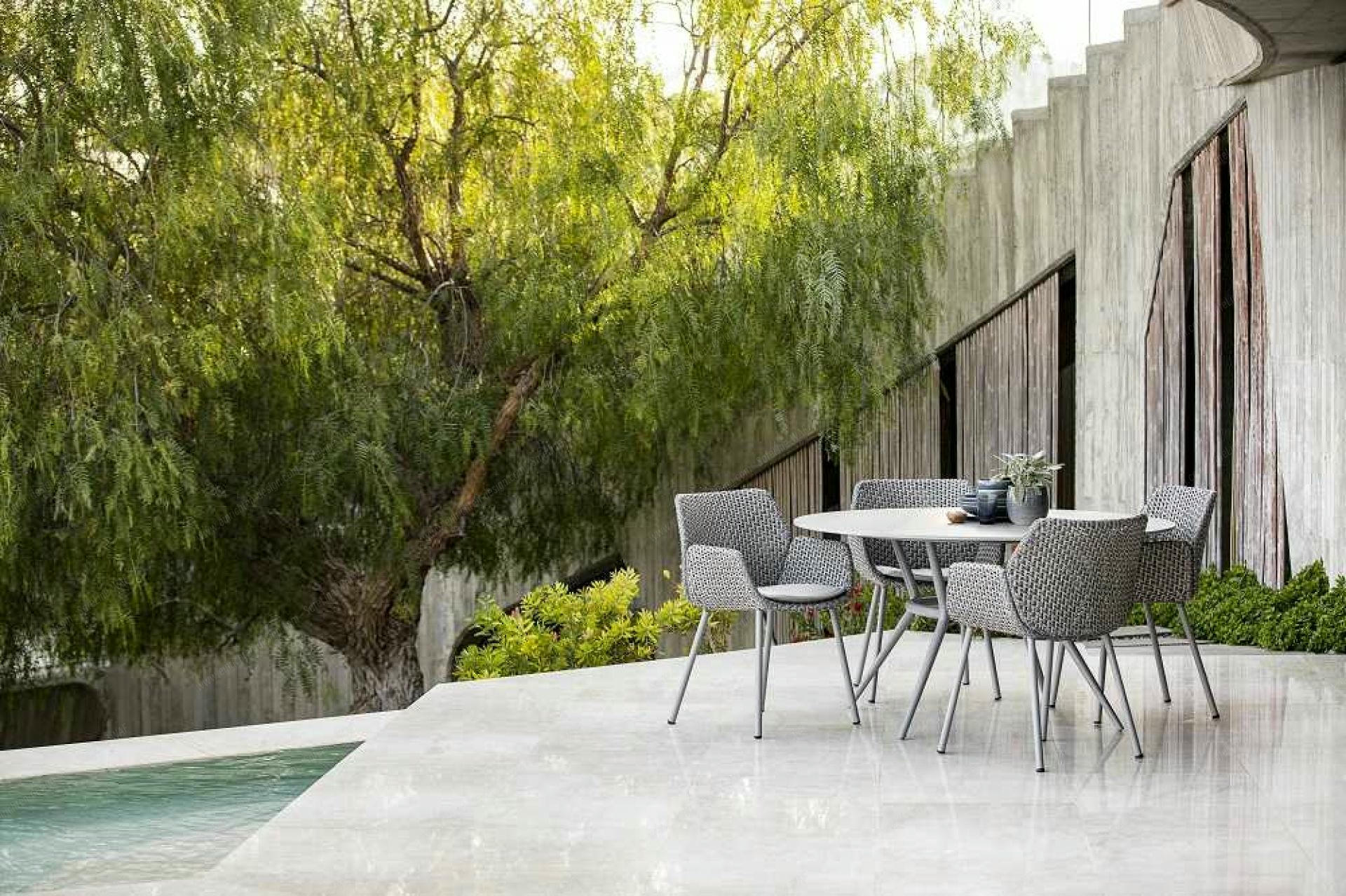 Joy Outdoor dining table round frame light grey / table top compact laminate Cane-Line