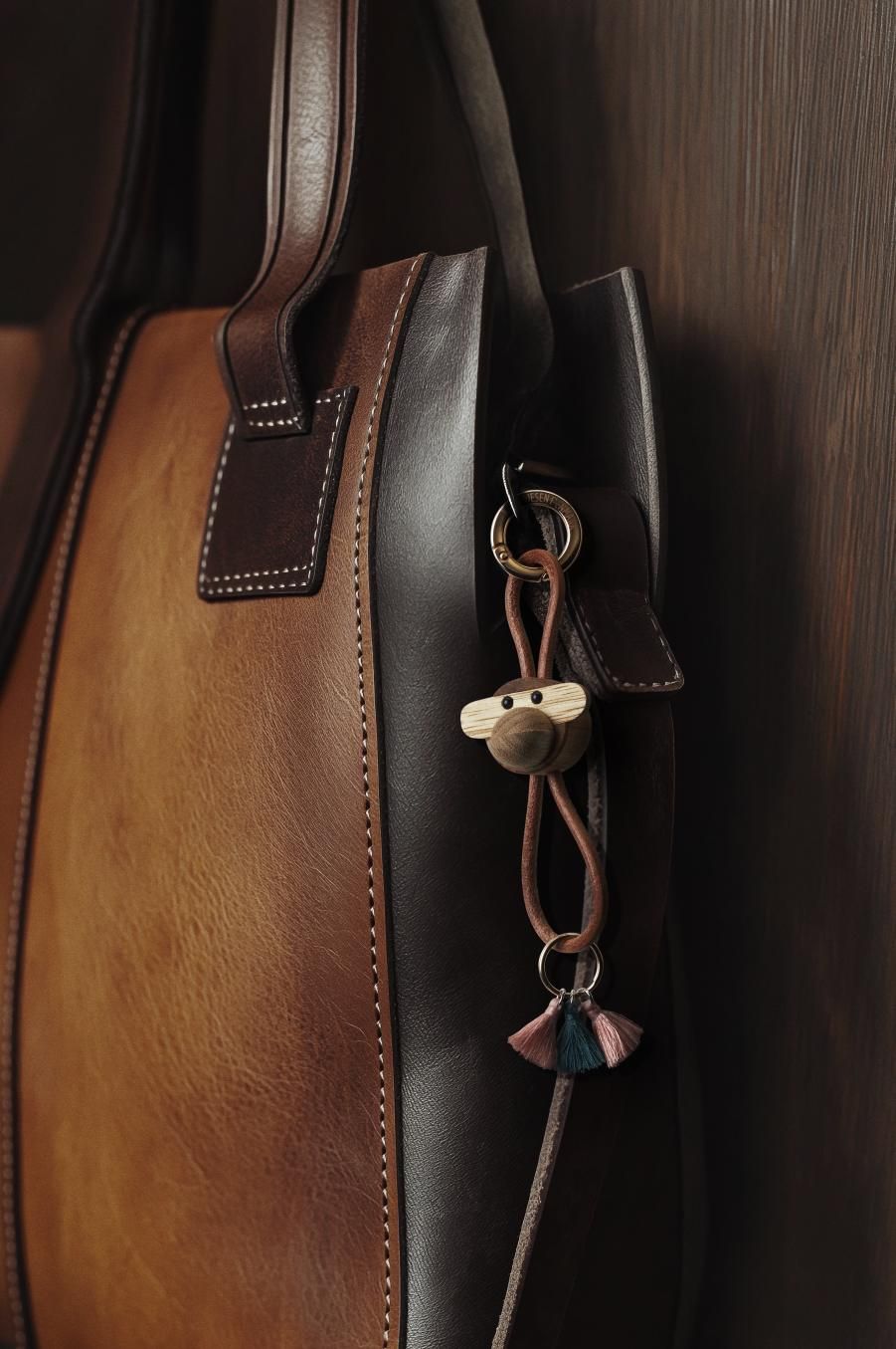 Monkey key ring gold-coloured metal with natural leather Kay Bojesen