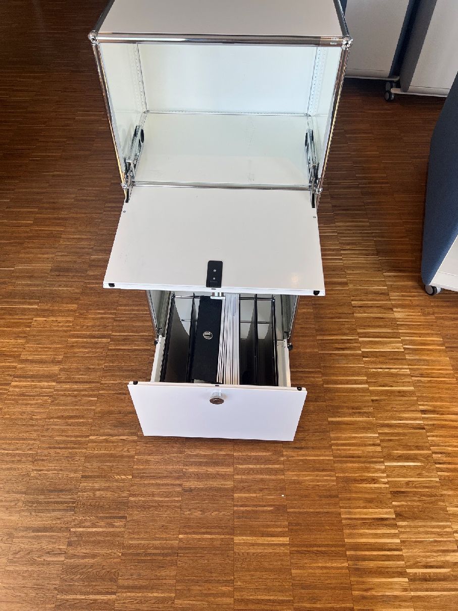 USM Haller Highboard with 2 hinged doors at the top/middle and 1 pull-out door with hanging storage at the bottom pure white display model/used furniture 