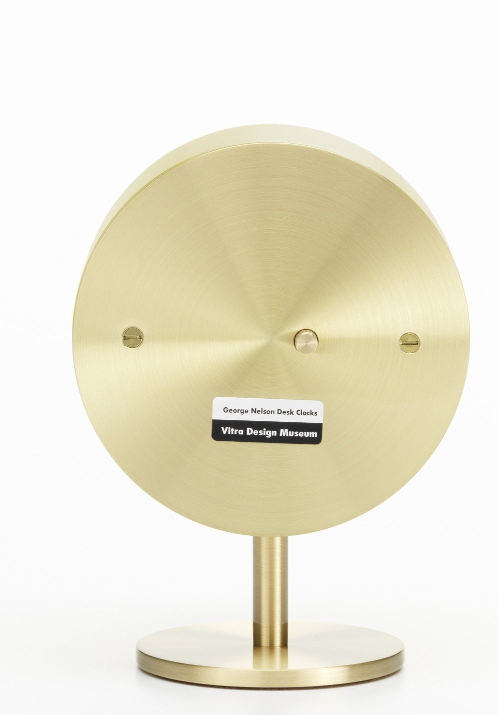 Rückseite der goldenen Night Clock Tischuhr von Vitra, moderne Tischuhr für Schlafzimmer.