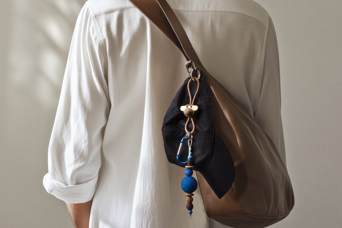 Monkey key ring gold-coloured metal with natural leather Kay Bojesen