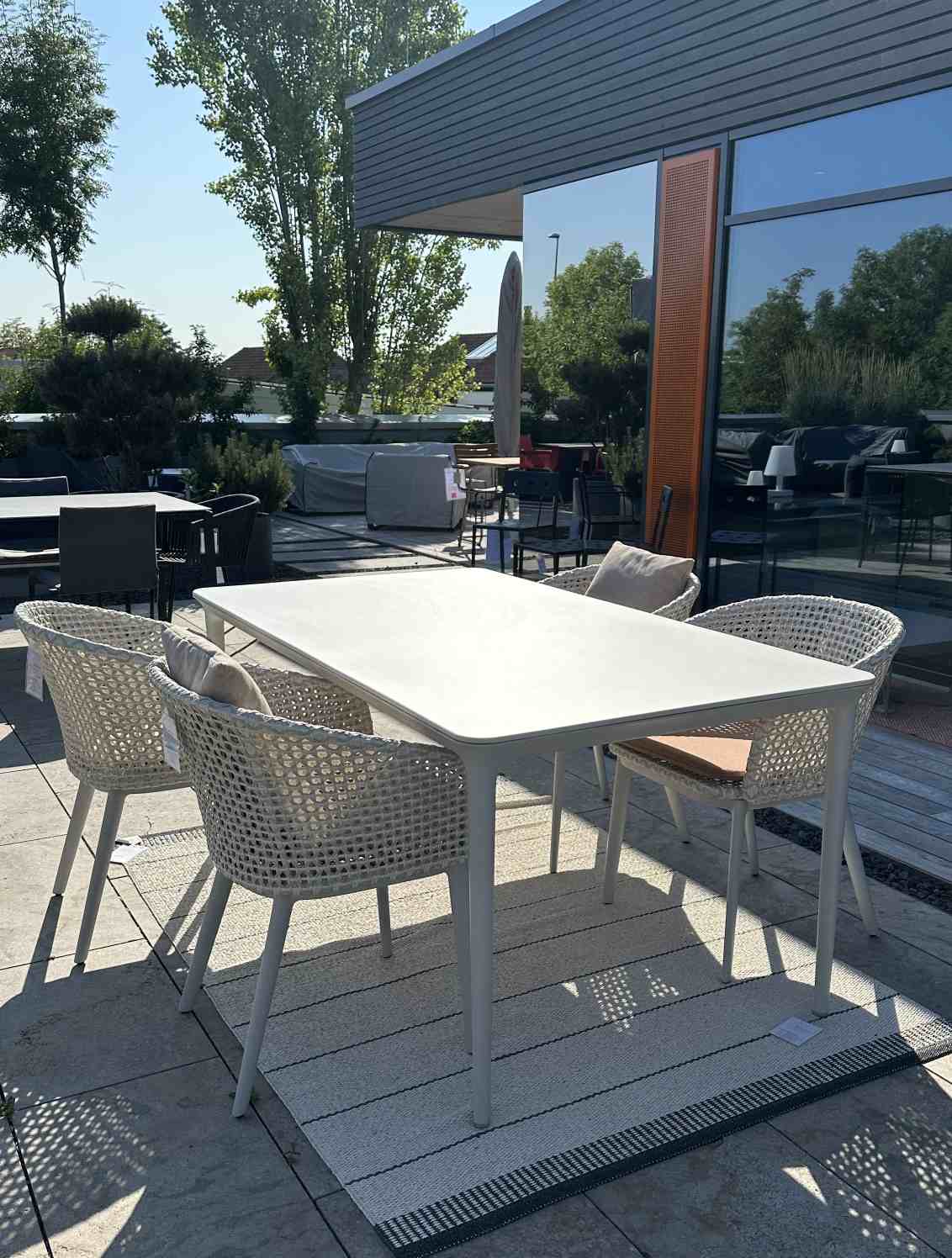 Bellmonde Table and Mbrace Armchair Combination Outdoor Dedon EXHIBITION PIECE