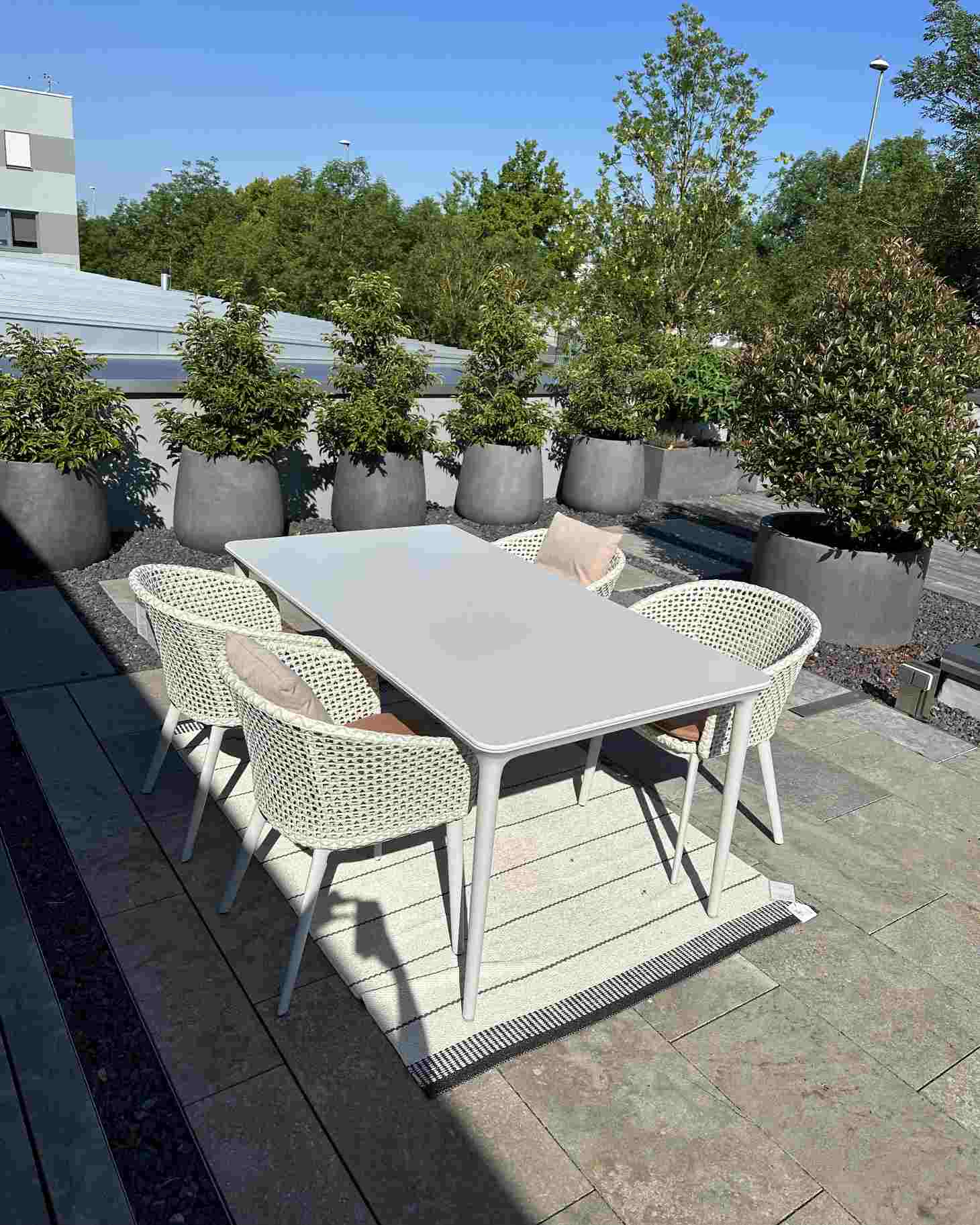 Bellmonde Table and Mbrace Armchair Combination Outdoor Dedon EXHIBITION PIECE