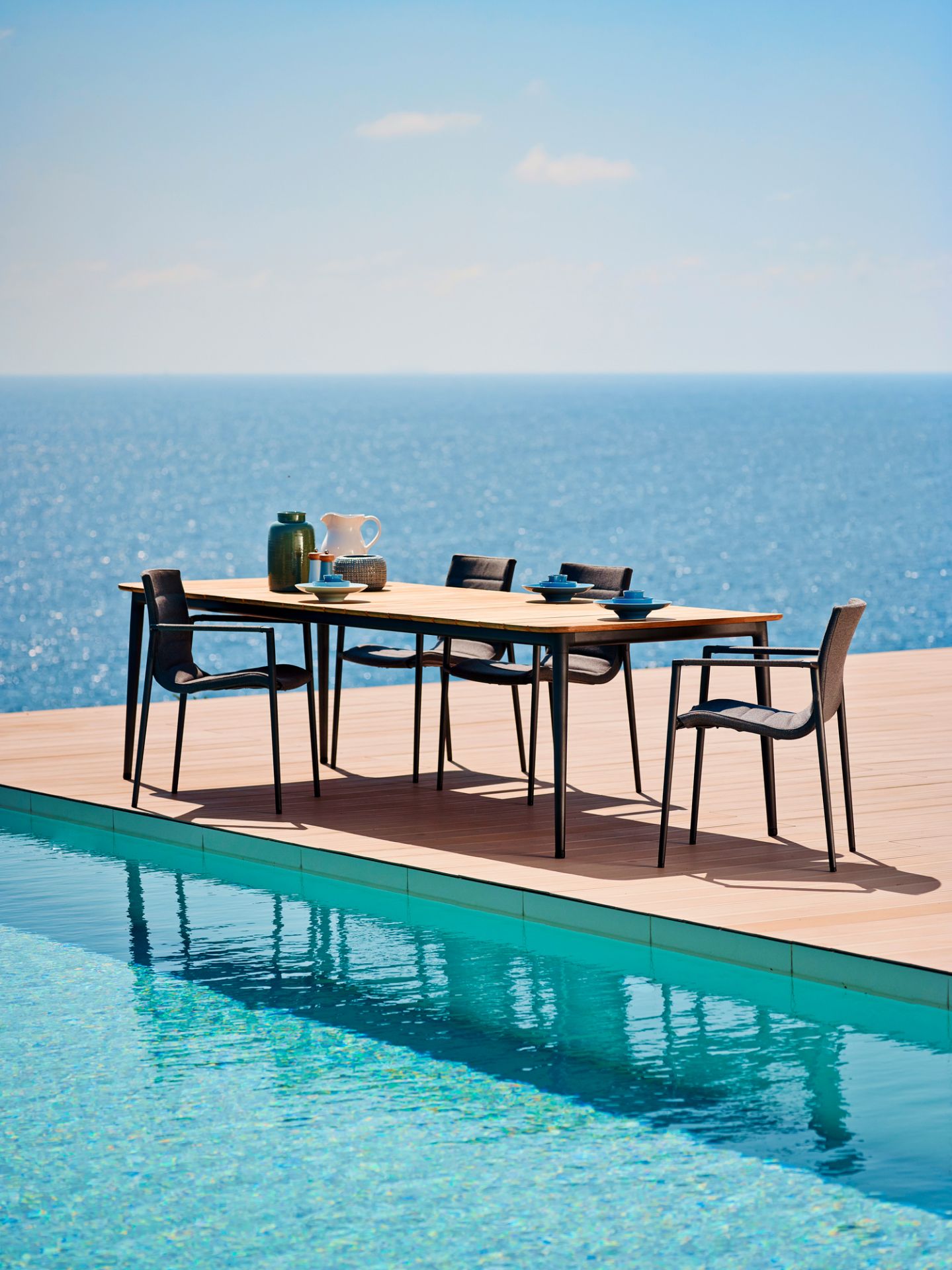 Core Outdoor Dining table teak Cane-Line small Lavagrau