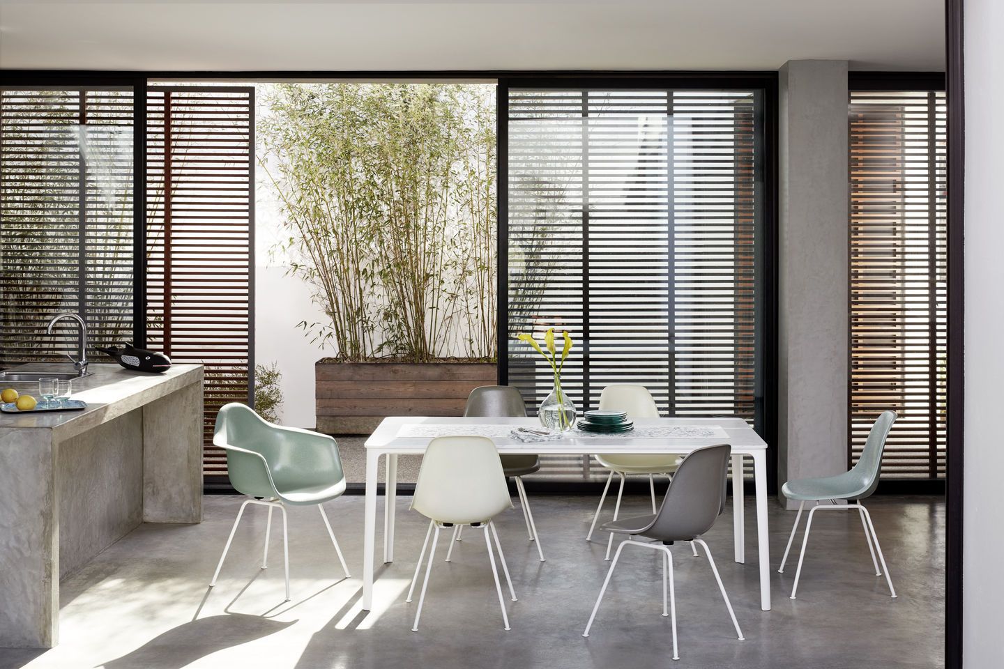 Eames Plastic Arm Chair DAX with seat cushion Vitra