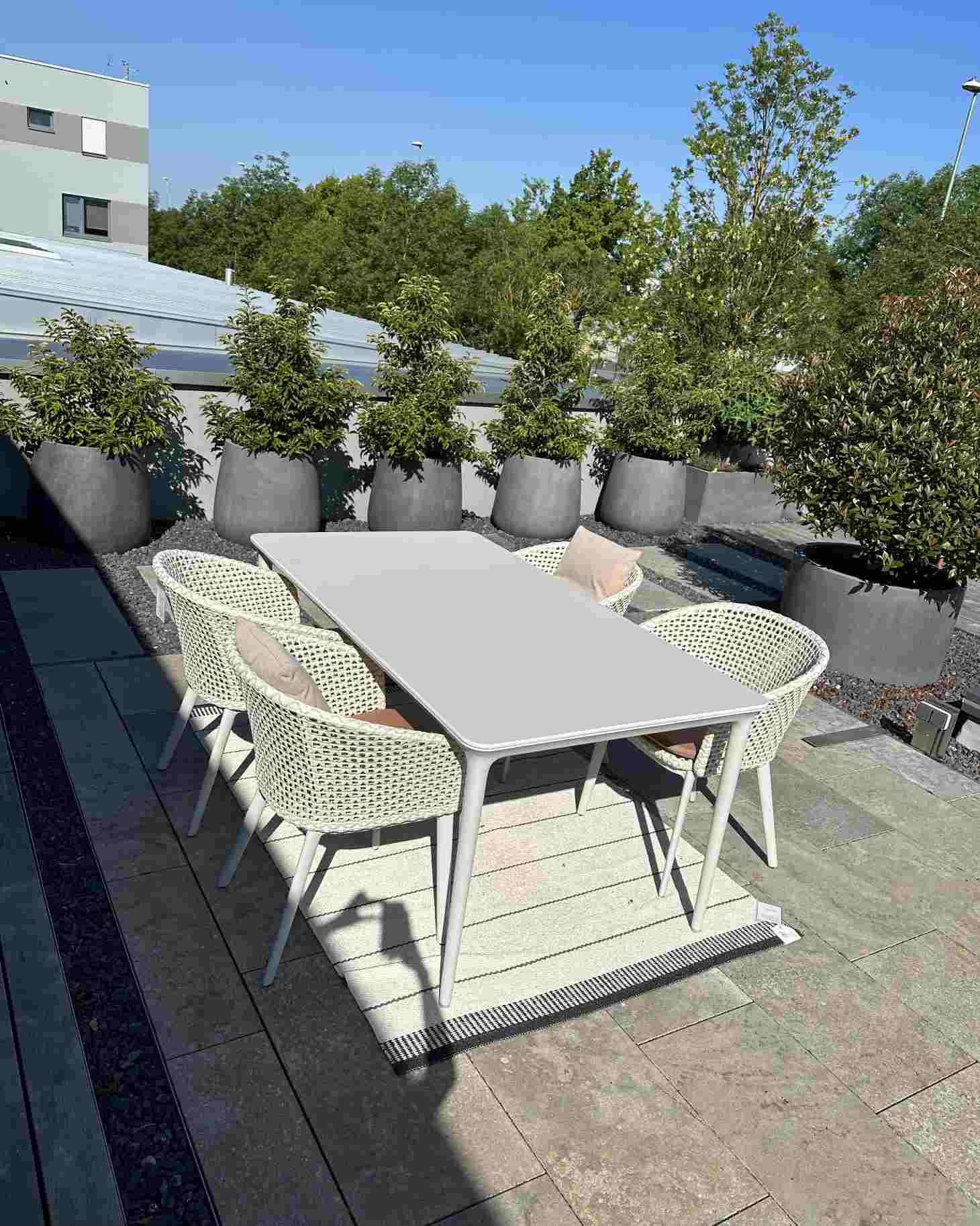 Bellmonde Table and Mbrace Armchair Combination Outdoor Dedon EXHIBITION PIECE