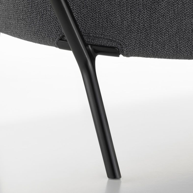Detailaufnahme vom Slow Sofa mit grauem Stoffbezug und schwarzem Metallfuß von Vitra.