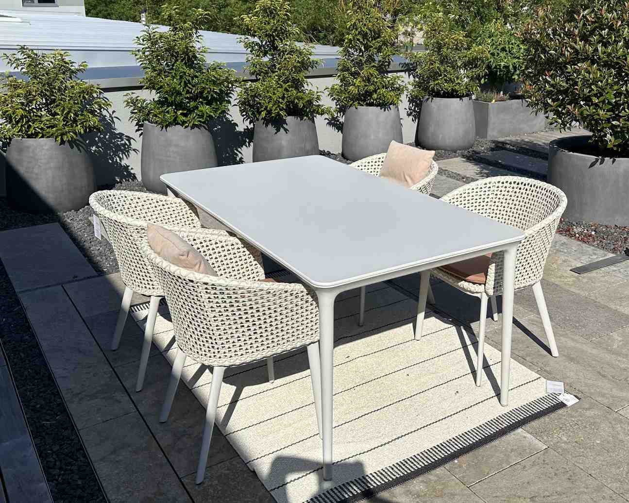 Bellmonde Table and Mbrace Armchair Combination Outdoor Dedon EXHIBITION PIECE