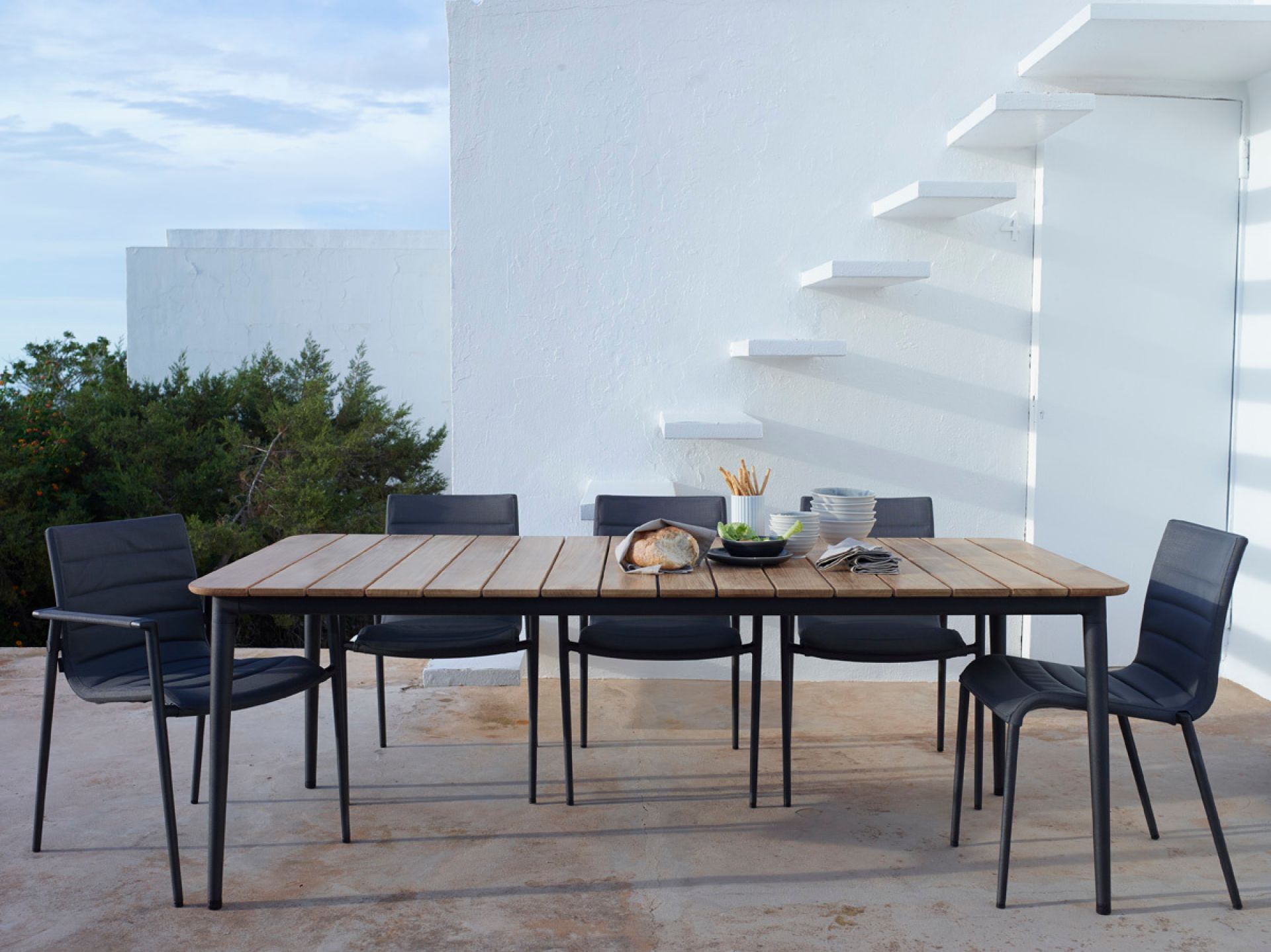 Core Outdoor Dining table teak Cane-Line small Lavagrau
