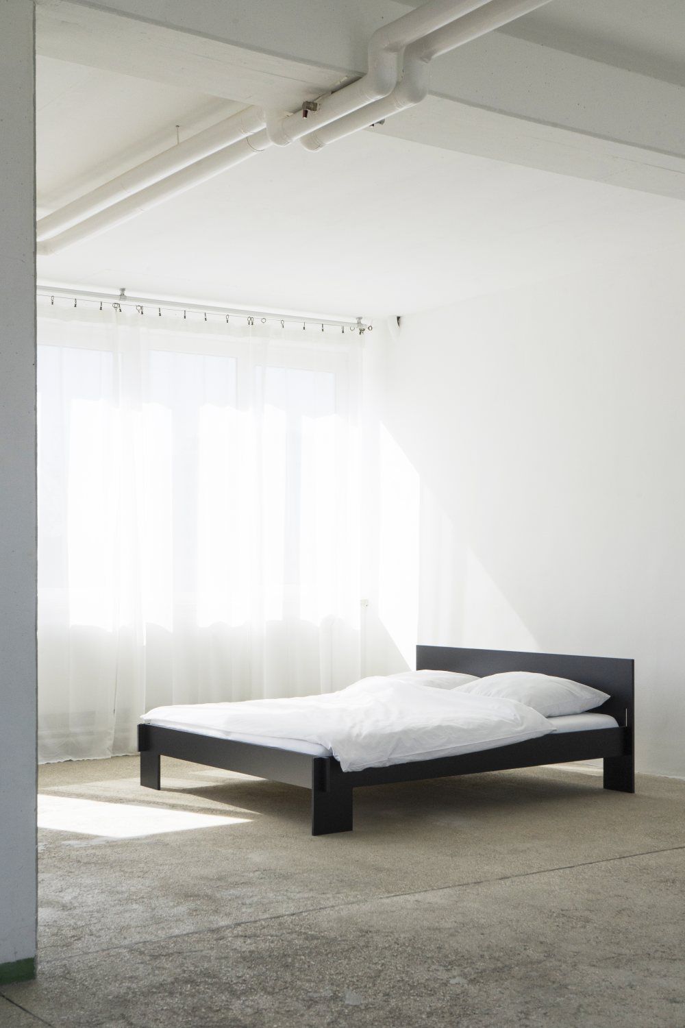  Seven sleeper bed with headboard Nils Holger Moormann